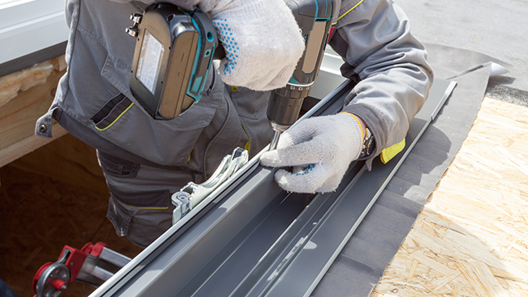 A professional facility builder assembling a structure