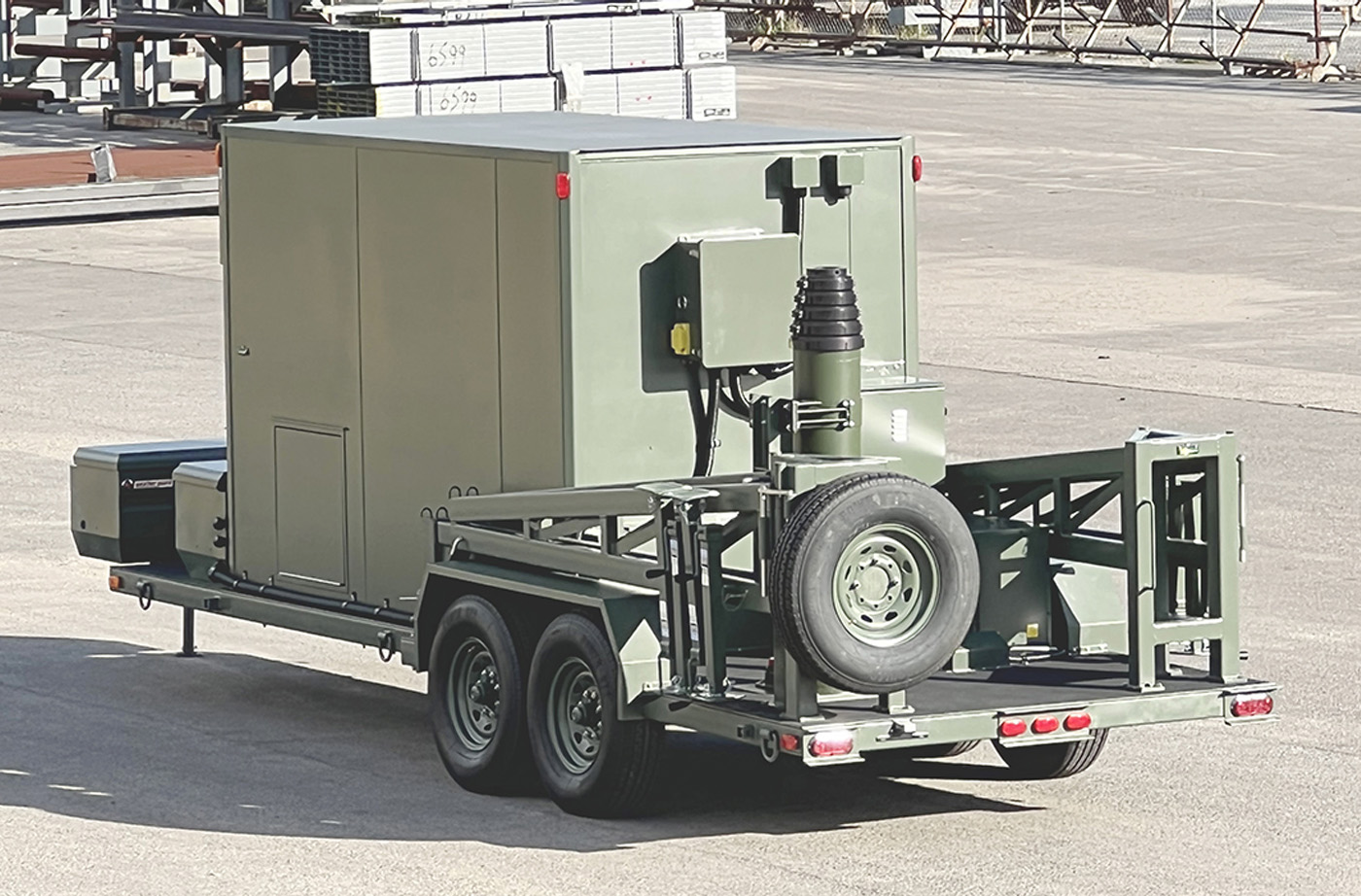 Green mobile armoured command center in IMP parking lot