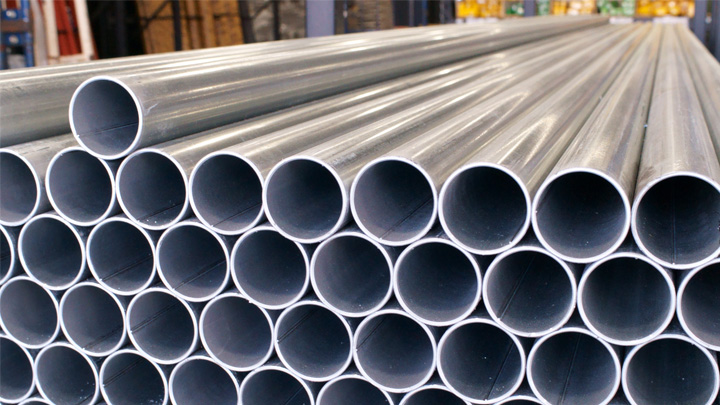 A closeup of steel pipes in a warehouse
