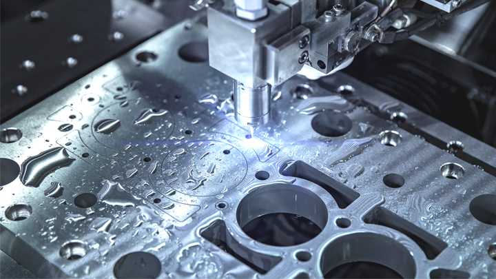 A closeup of a waterjet cutting machine