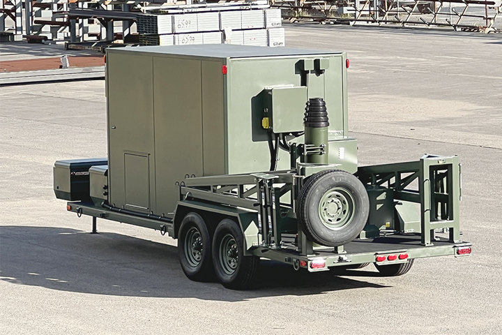 Green trailer in a parking lot